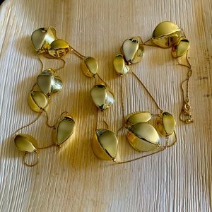 Attractive long gold toned necklace